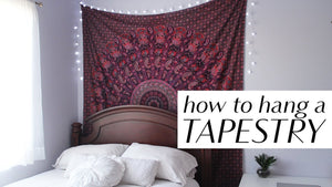 How to hang a tapestry on the wall in three different and easy ways, including damage-free methods for those who live in dorms or apartments